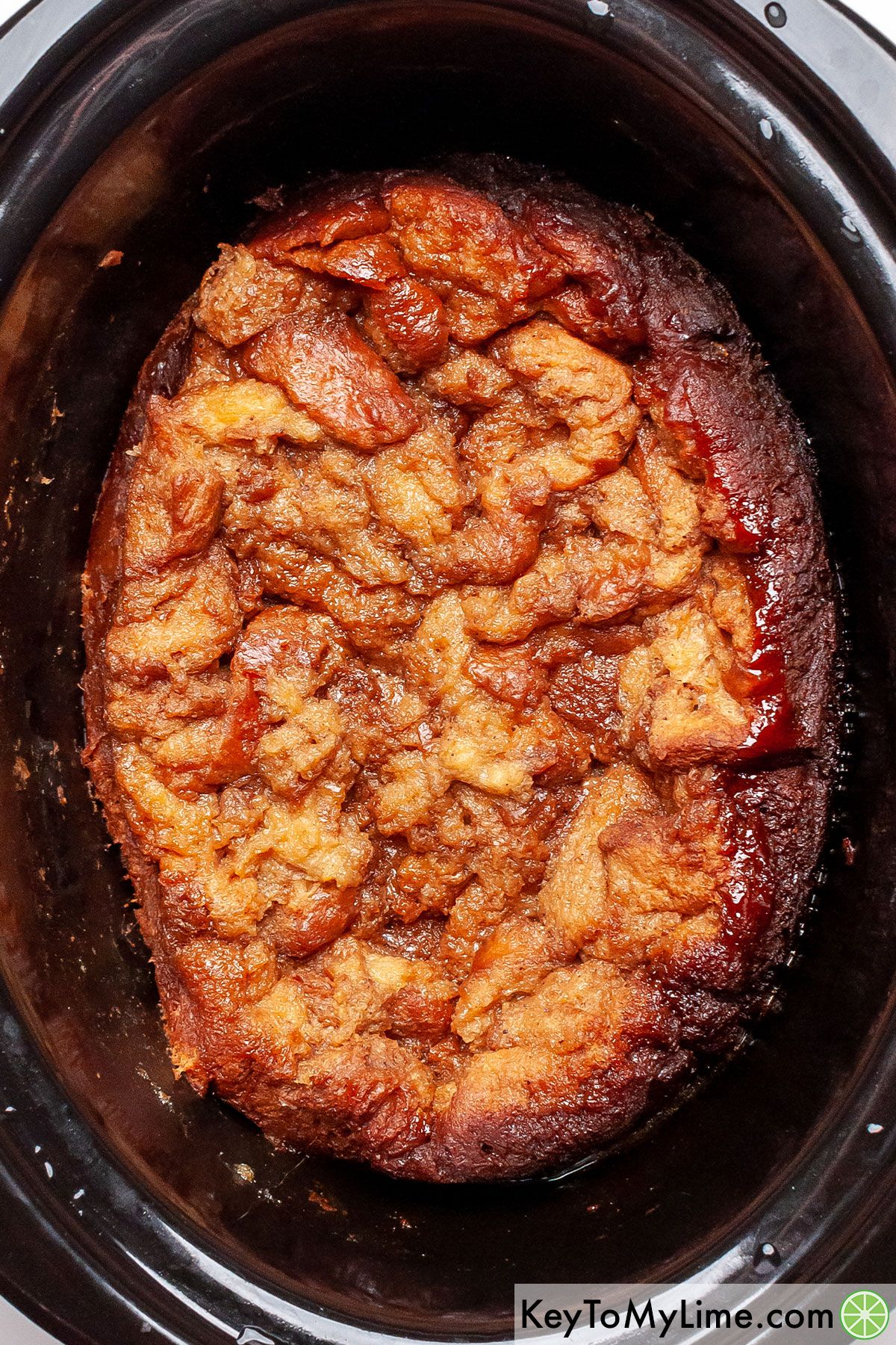 French toast casserole in a slow cooker right after it finished cooking.